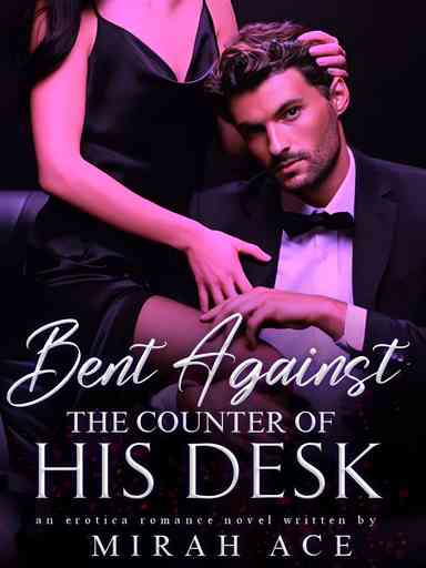 Bent Against The Counter Of His Desk